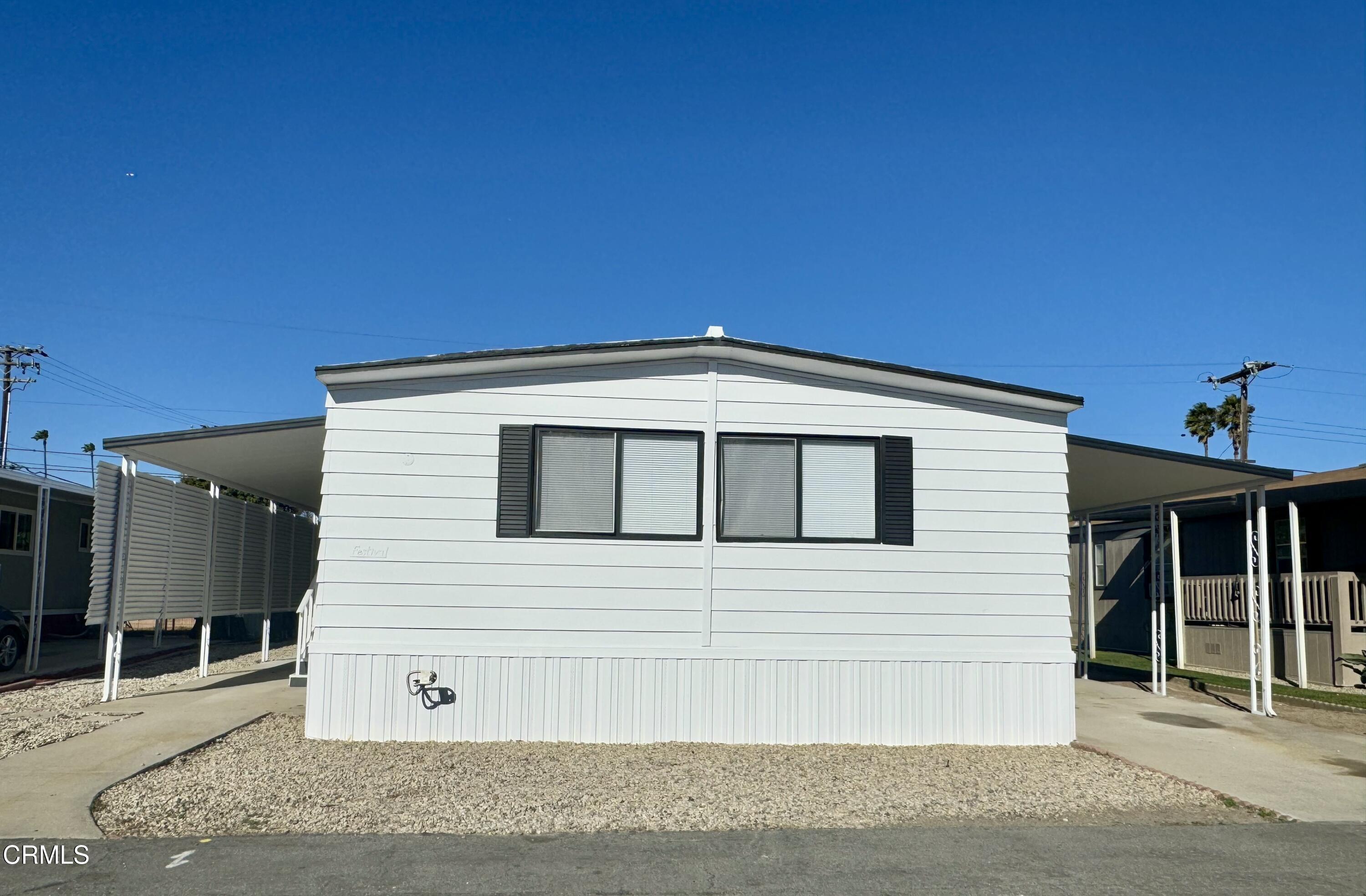 285 Ibsen Place, Unit 10 Oxnard, CA 93033 - Photo 2 of 32 a front view of a house