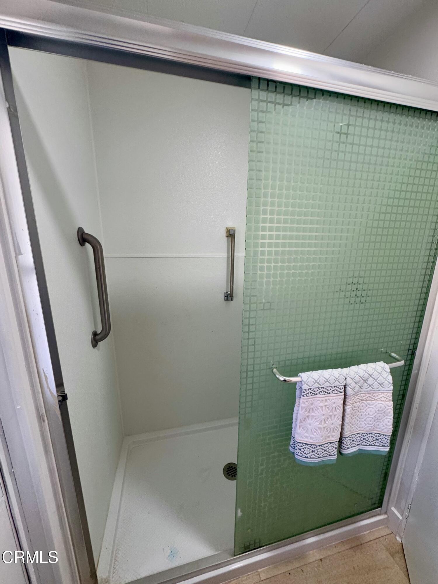 285 Ibsen Place, Unit 10 Oxnard, CA 93033 - Photo 22 of 32 a bathroom with a shower