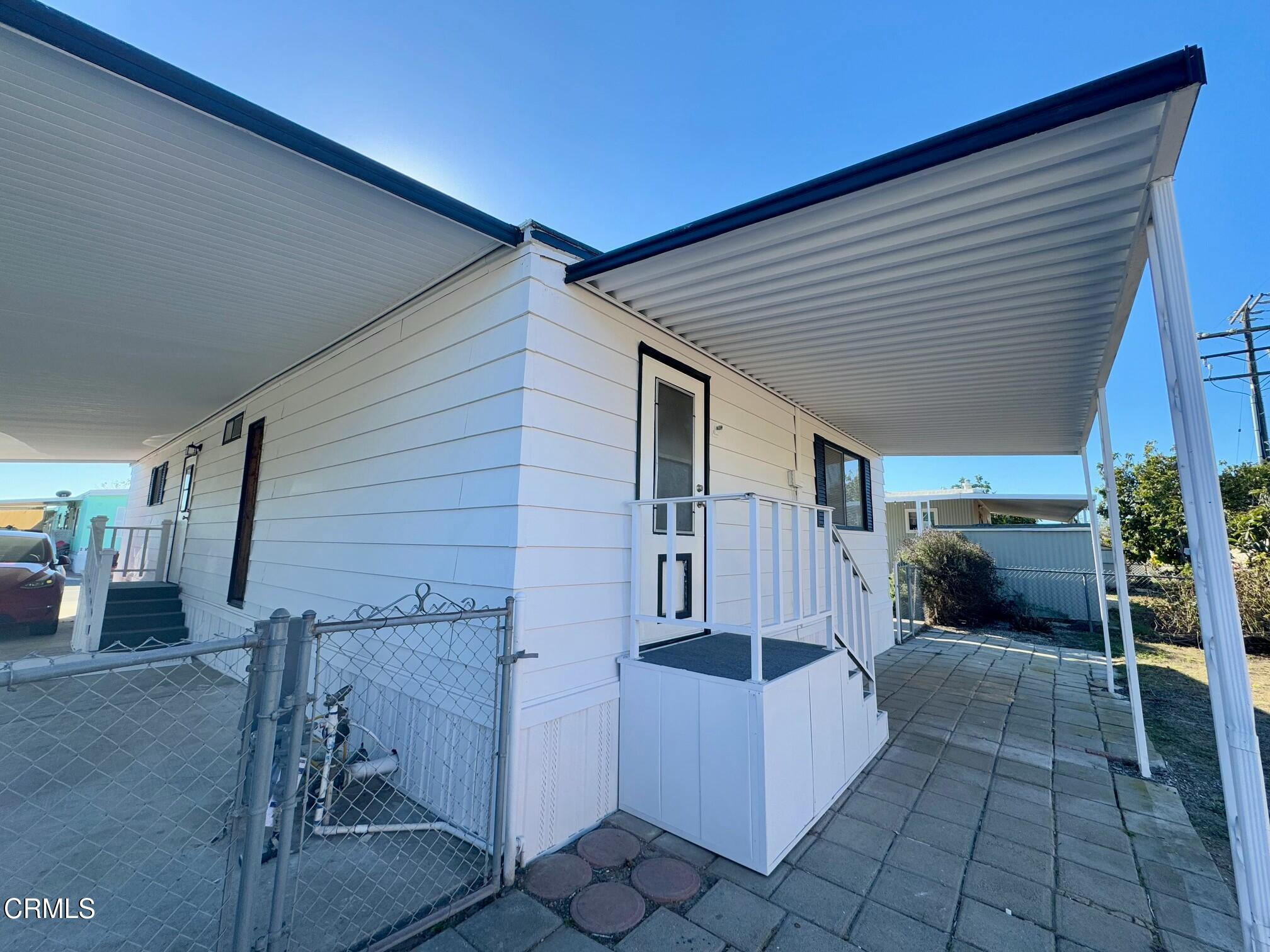 285 Ibsen Place, Unit 10 Oxnard, CA 93033 - Photo 29 of 32 a view of back yard of the house