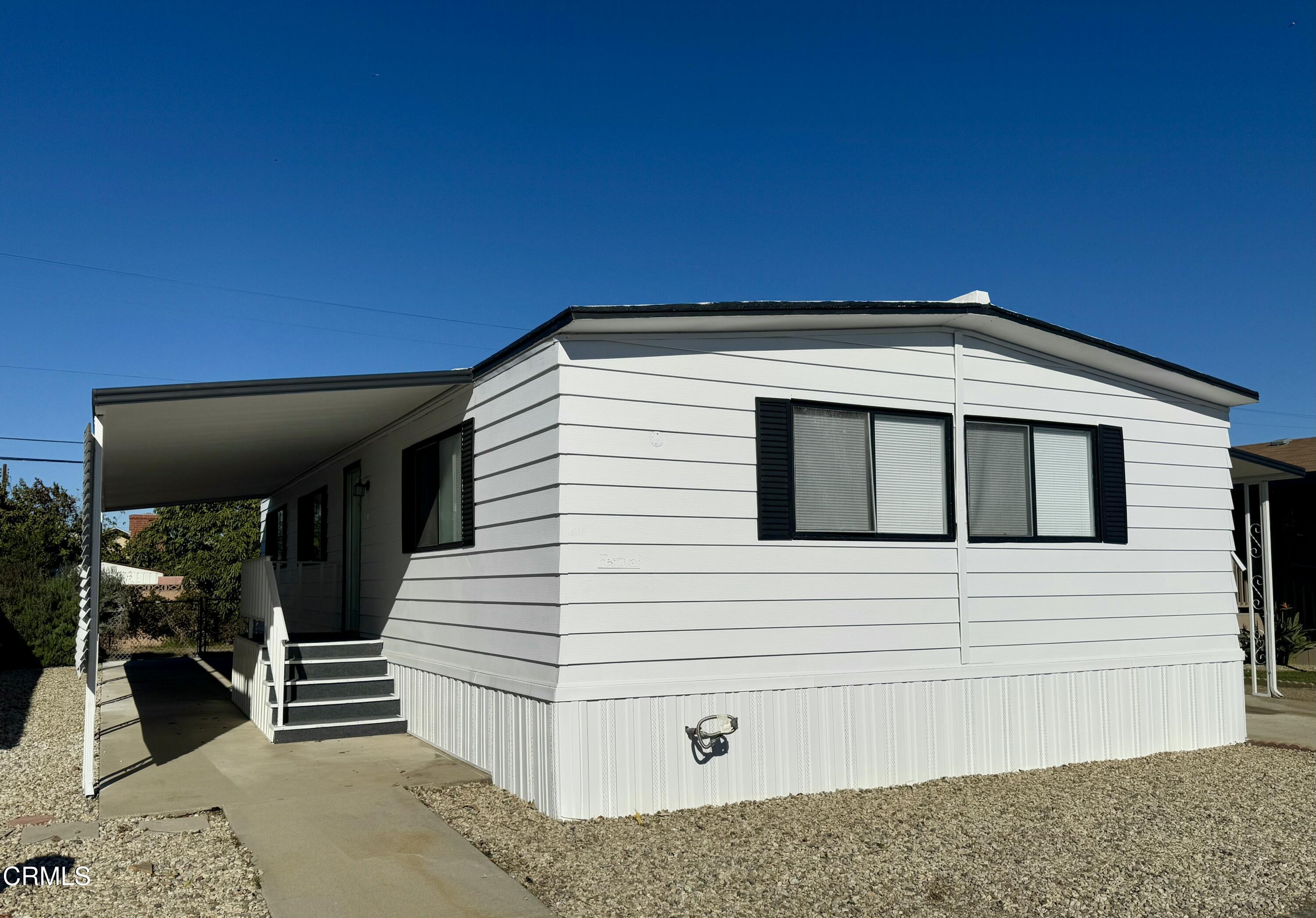 285 Ibsen Place, Unit 10 Oxnard, CA 93033 - Photo 3 of 32 a view of a house with a door