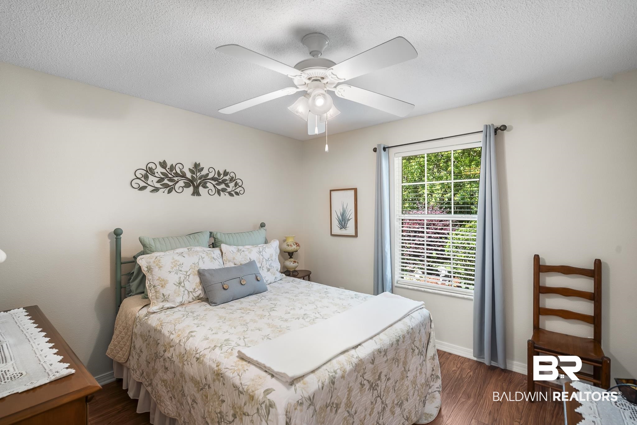 1802 South Bay Street Foley, AL 36535 - Photo 22 of 30 Bedroom featuring dark wood-style floors, baseboards, a textured ceiling, and ceiling fan