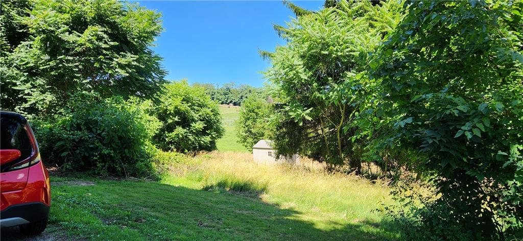 667 Jefferson Road Perryopolis, PA 15473 - Photo 6 of 13 a view of swimming pool from a garden