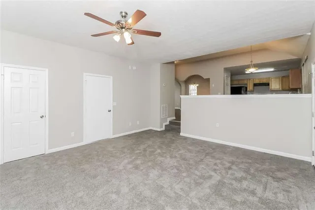 a view of a livingroom with a workspace