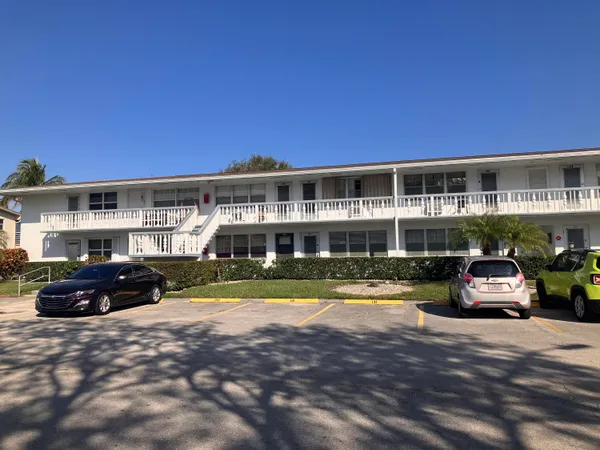 a car parked in front of a house