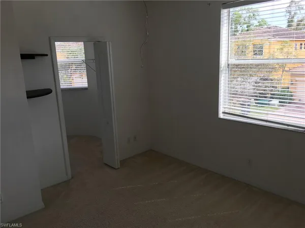 an empty room with a window