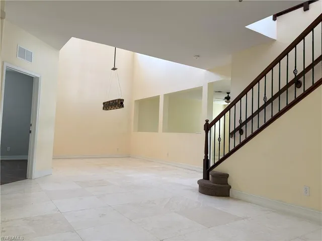 a view of an entryway with staircase