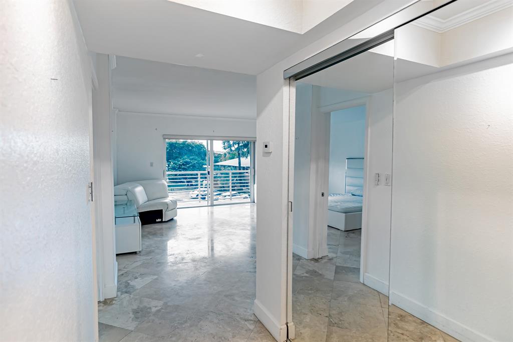 2900 Northeast 30th Street, Unit 3F Fort Lauderdale, FL 33306 - Photo 10 of 30 a bathroom with a toilet and a shower