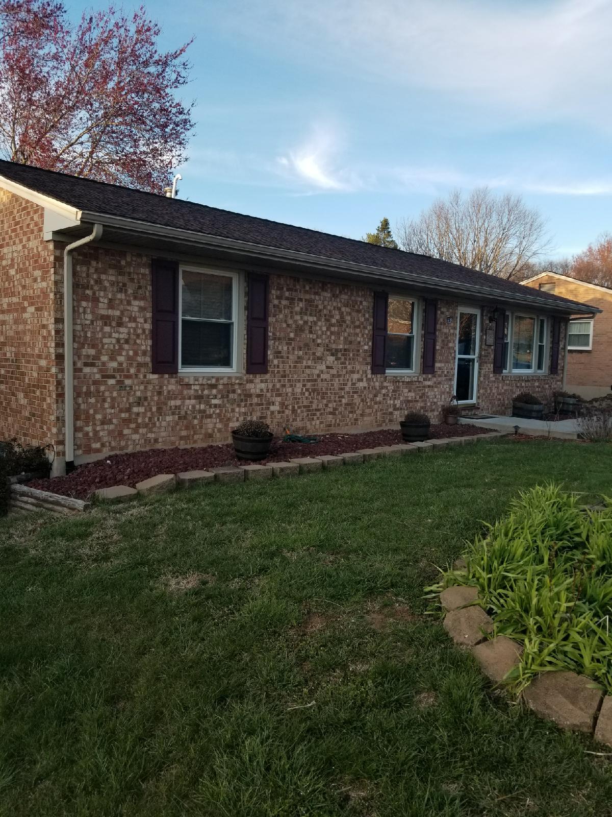 5423 Twilight Road Roanoke, VA 24019 - Photo 1 of 23 a front view of a house with a garden