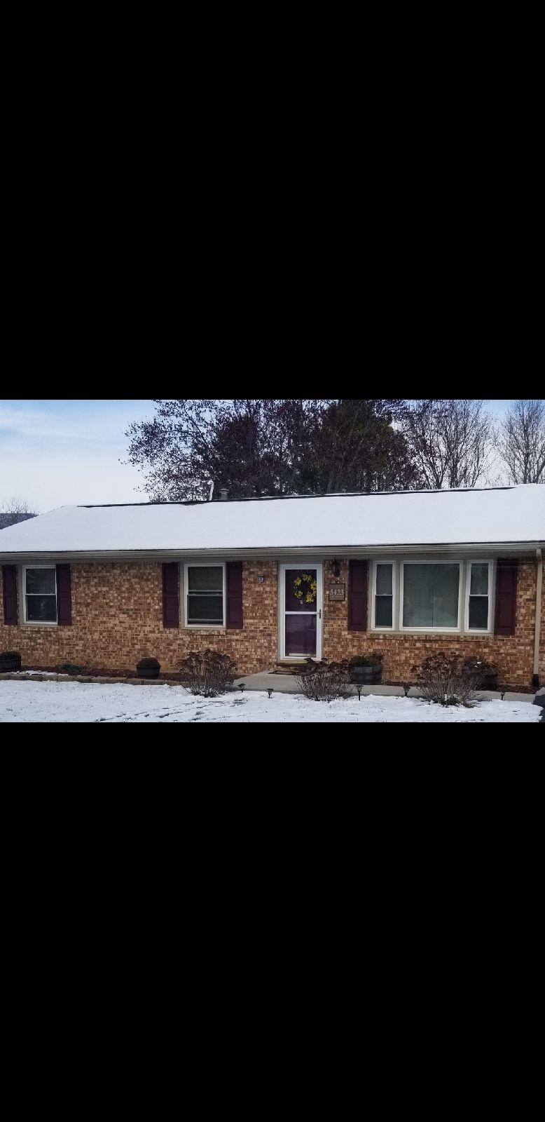 5423 Twilight Road Roanoke, VA 24019 - Photo 23 of 23 a front view of a house with a garden
