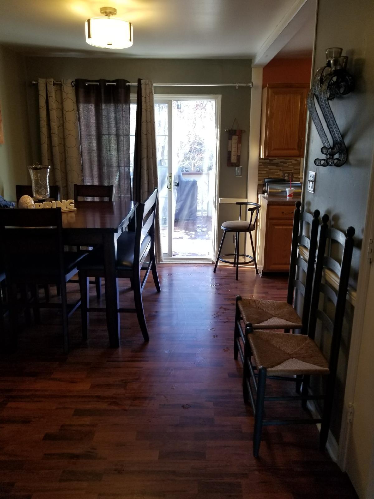 5423 Twilight Road Roanoke, VA 24019 - Photo 8 of 23 a view of a dining room with furniture window and wooden floor