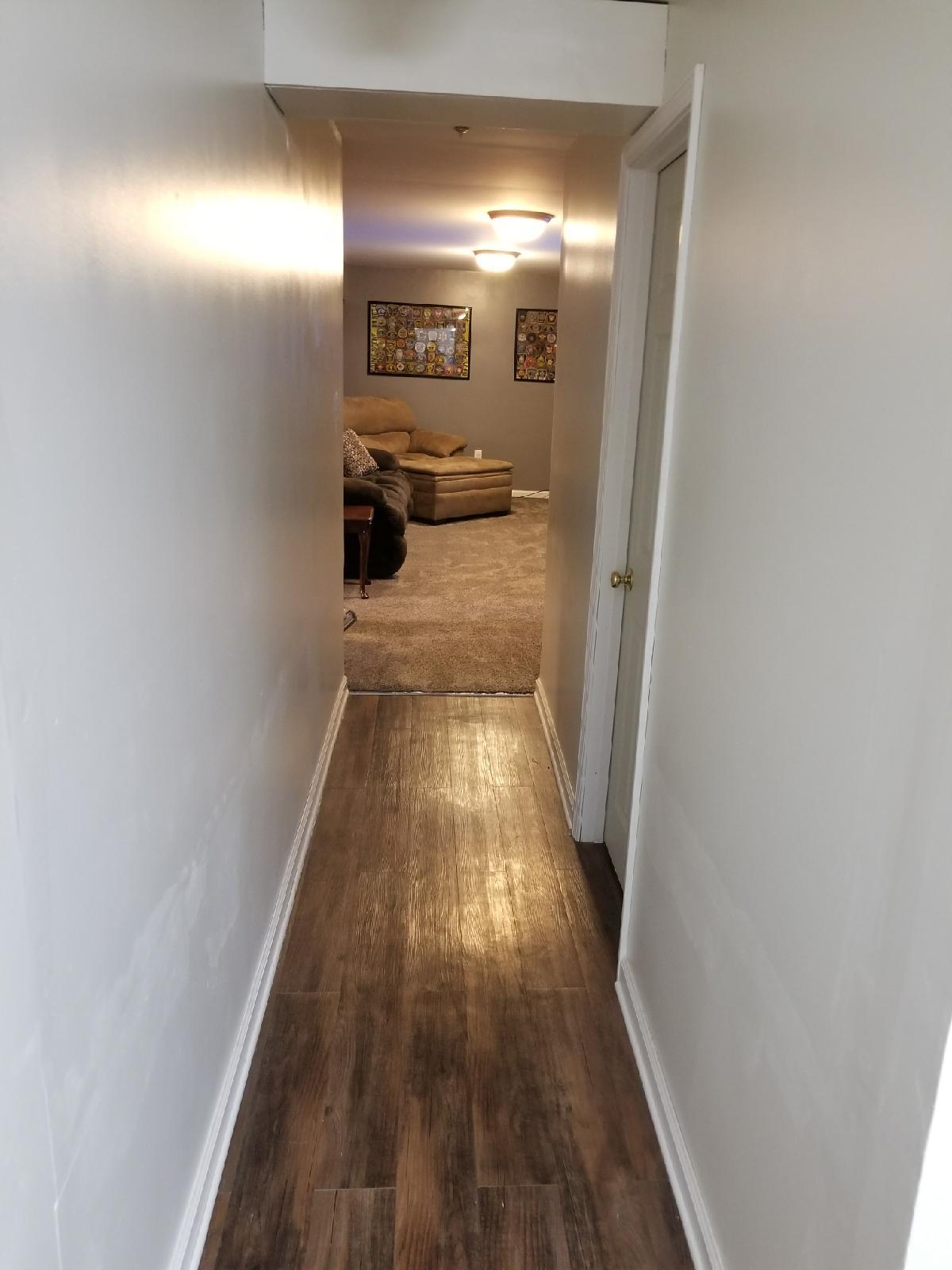 5423 Twilight Road Roanoke, VA 24019 - Photo 10 of 23 a view of a hallway with wooden floor