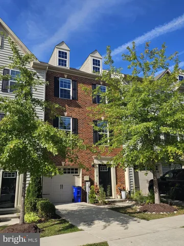 a front view of a multi story residential apartment building