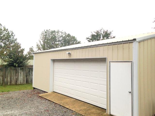 7724 Covington Road White House, TN 37188 - Photo 13 of 20 There is a 30x24 detached 2 car garage located behind the house. This is a perfect place for tinkering on rainy days.