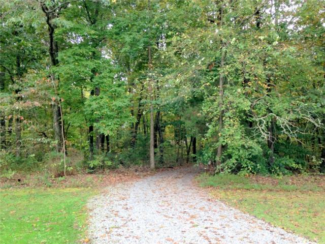 7724 Covington Road White House, TN 37188 - Photo 15 of 20 Additional pictures of the property. As you enter the property, you will travel up a long wooded driveway.