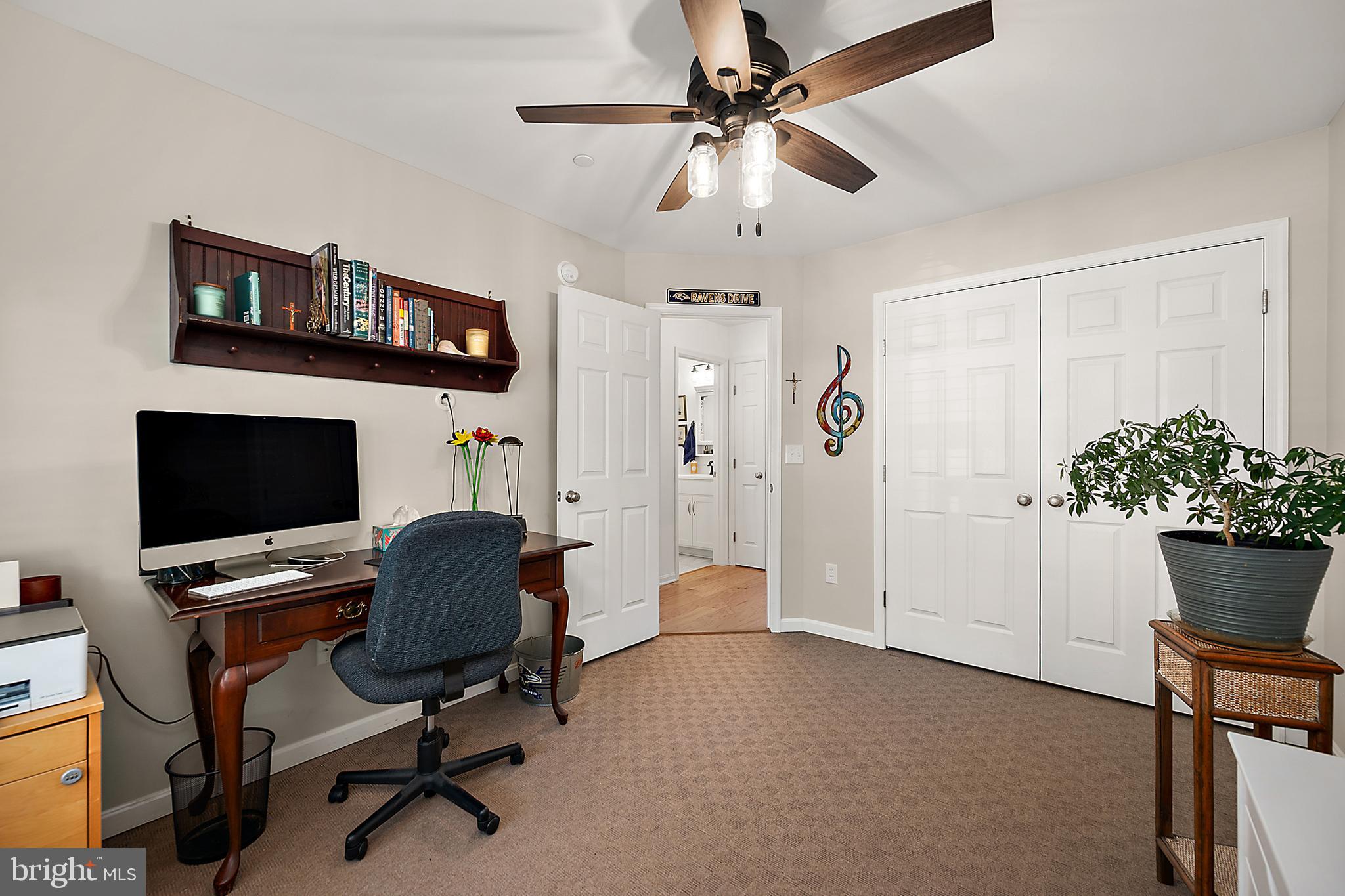 6098 Tarry Town Road Salisbury, MD 21801 - Photo 35 of 60 a view of a workspace with furniture and a window