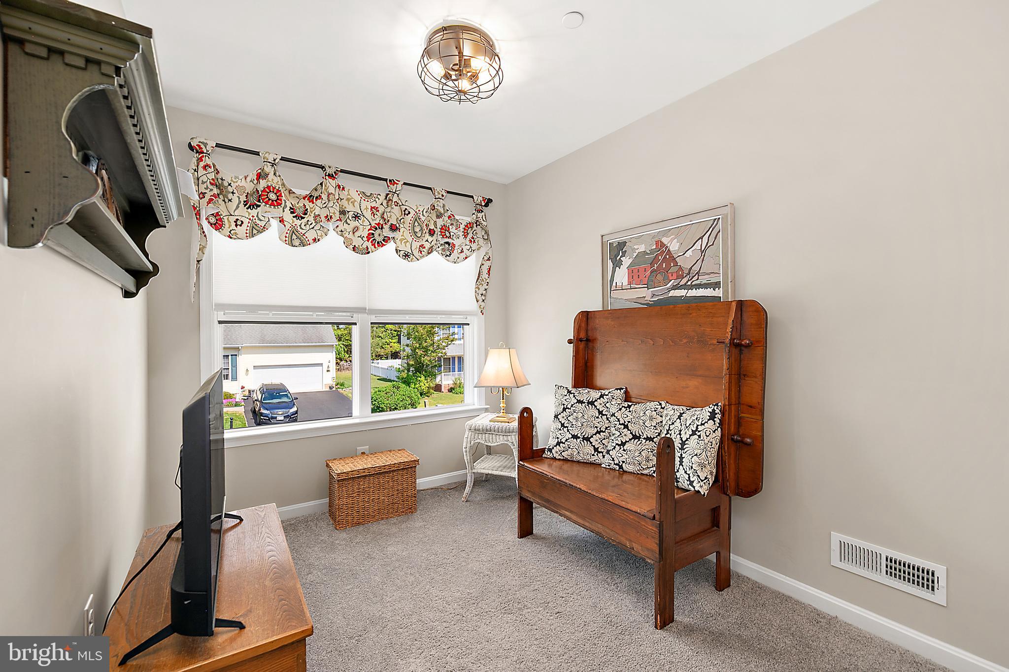 6098 Tarry Town Road Salisbury, MD 21801 - Photo 38 of 60 a bedroom with furniture and a window