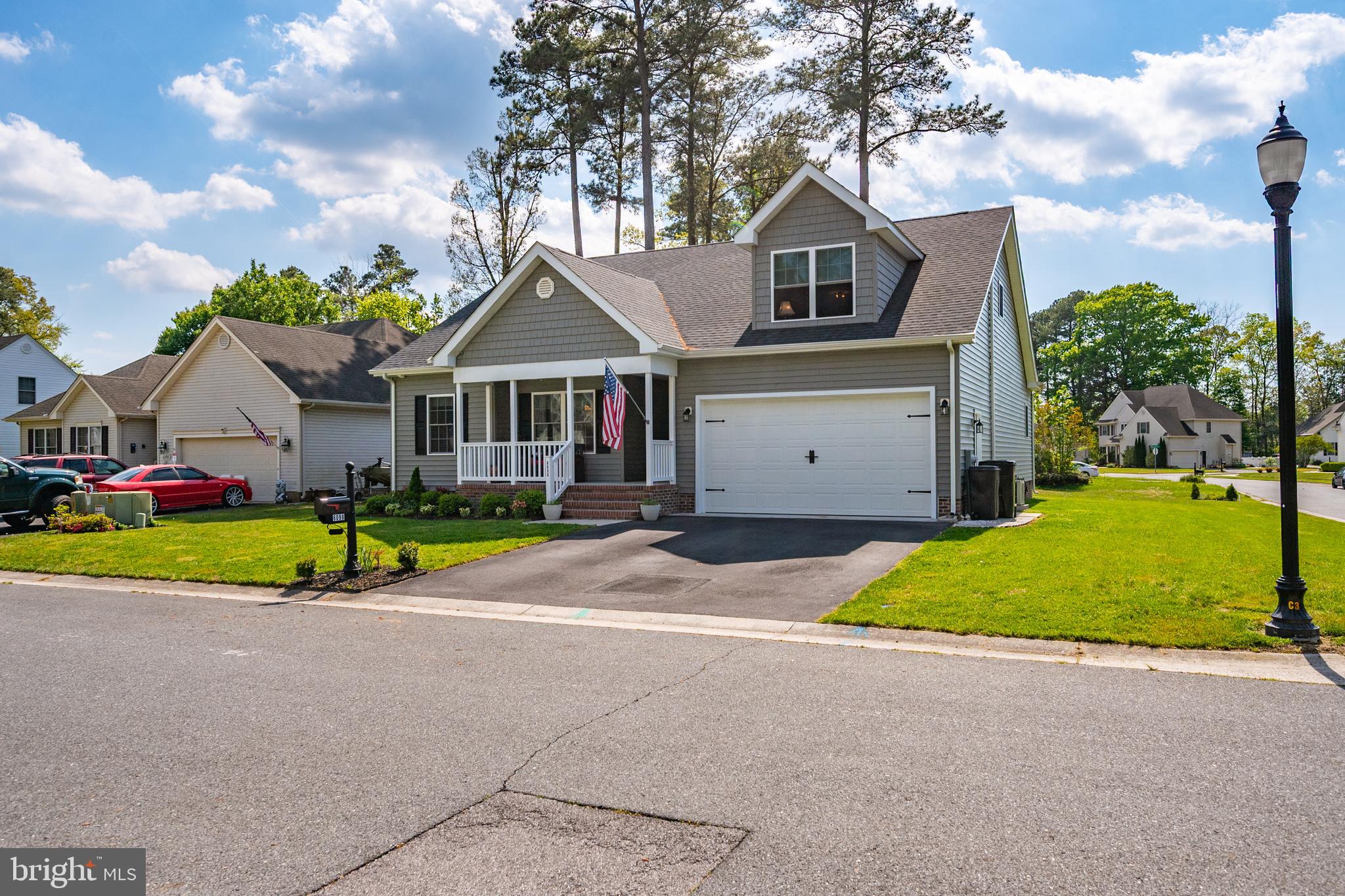6098 Tarry Town Road Salisbury, MD 21801 - Photo 4 of 60 a view of an house with backyard and bushes