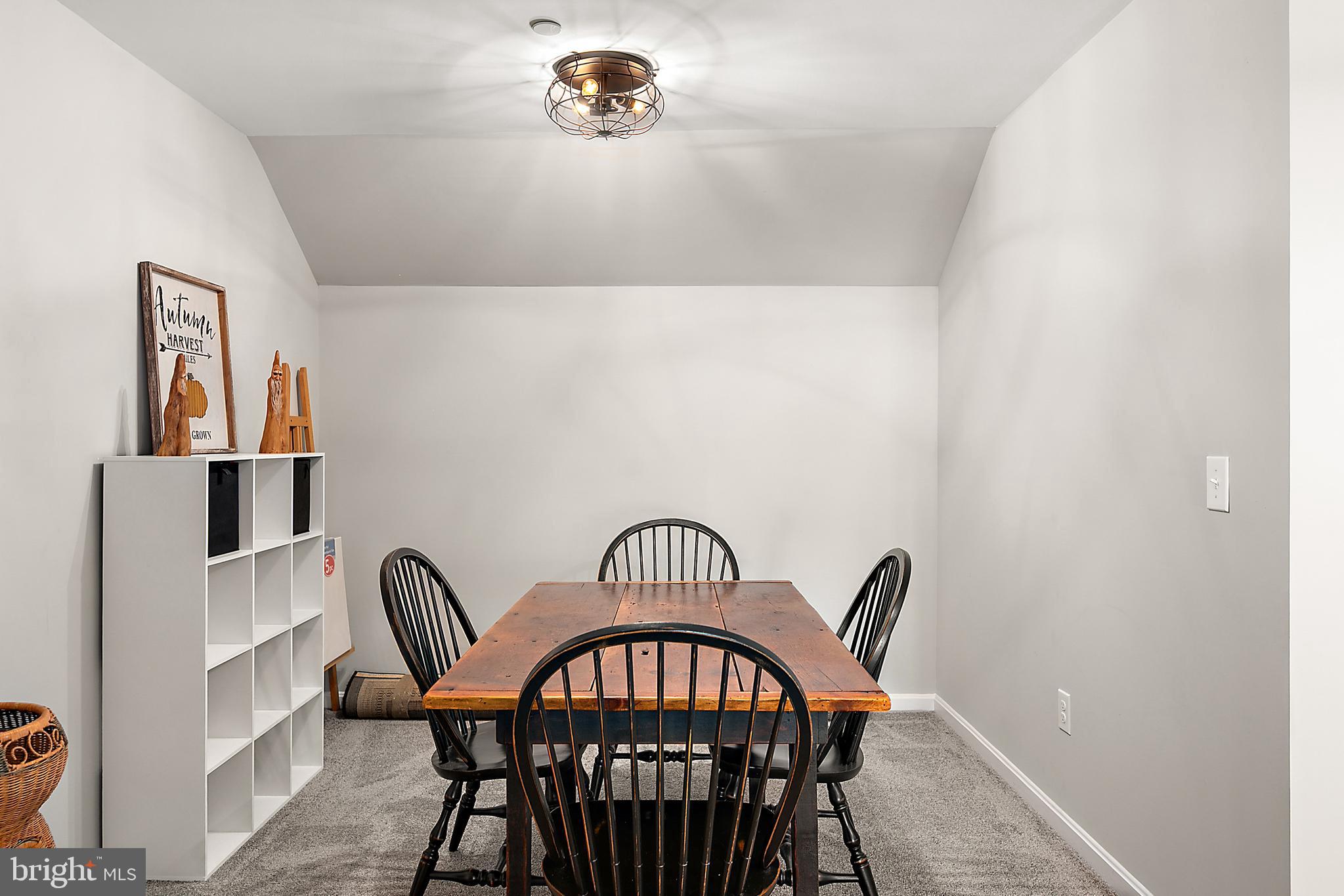 6098 Tarry Town Road Salisbury, MD 21801 - Photo 41 of 60 a view of a workspace with furniture and a window