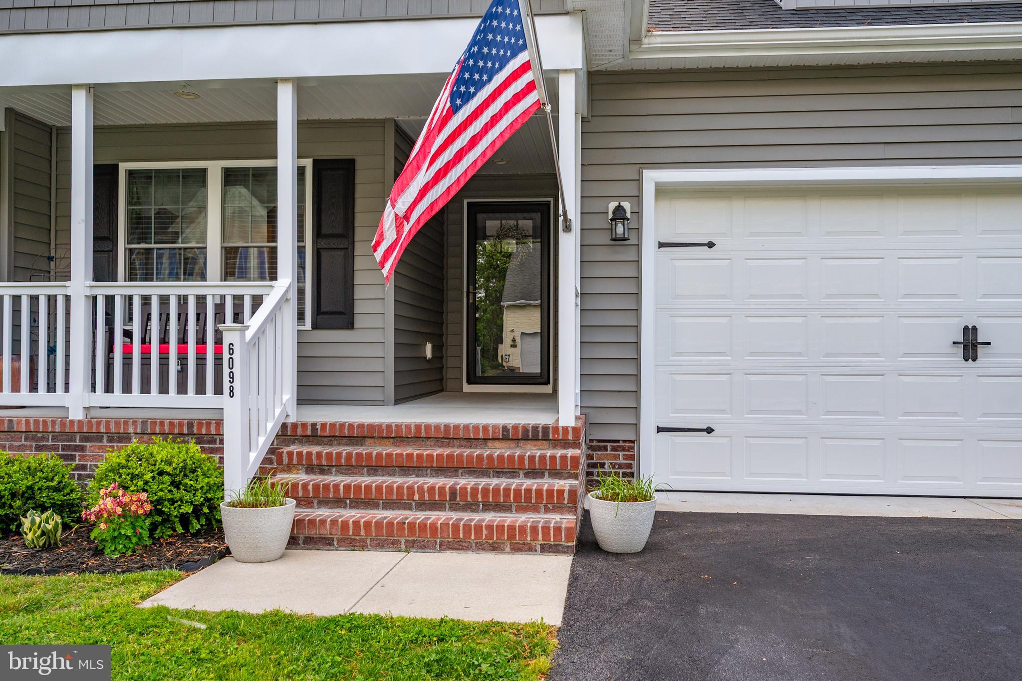 6098 Tarry Town Road Salisbury, MD 21801 - Photo 5 of 60 a view of a house with porch