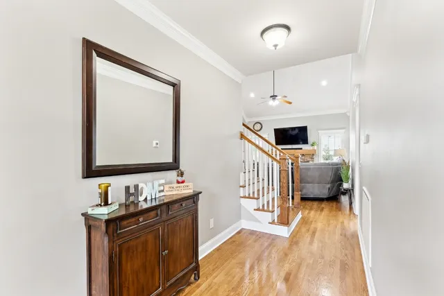 a en suite bathroom with a sink double vanity and a mirror