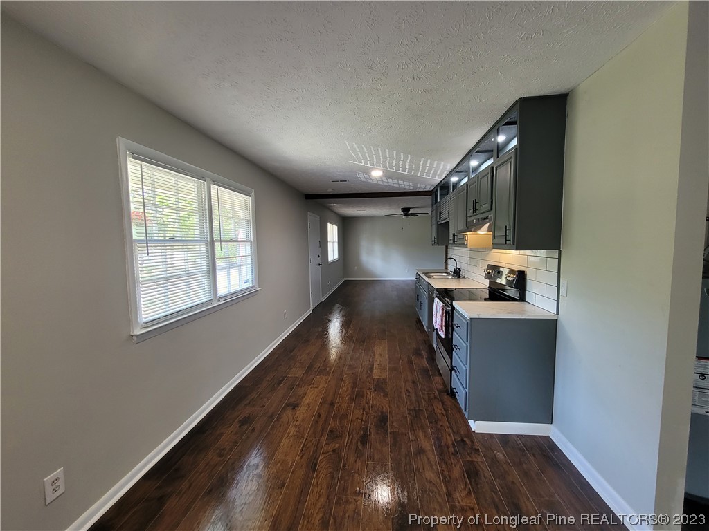 6442 Green Meadow Road Fayetteville, NC 28304 - Photo 20 of 48 a view of kitchen and wooden floor