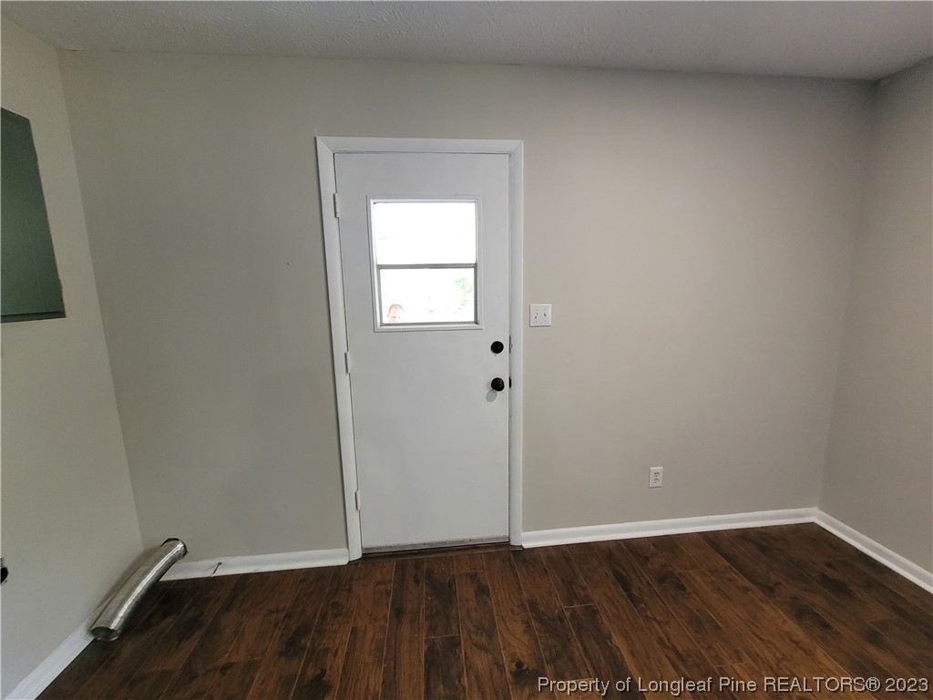 6442 Green Meadow Road Fayetteville, NC 28304 - Photo 24 of 48 an empty room with wooden floor and closet