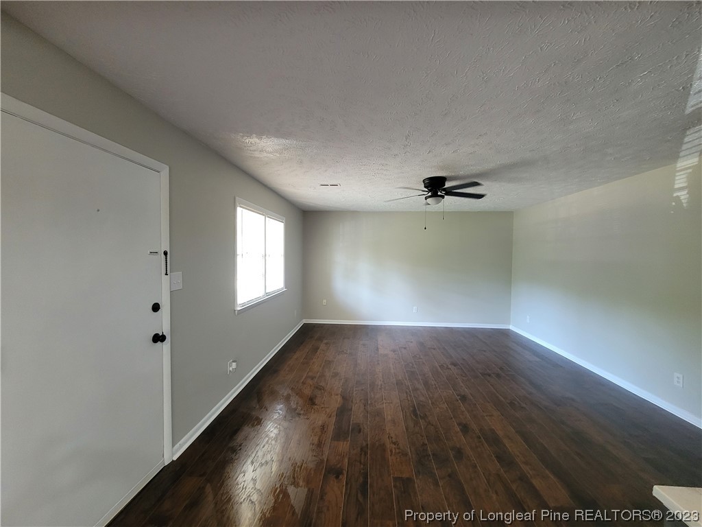 6442 Green Meadow Road Fayetteville, NC 28304 - Photo 25 of 48 wooden floor in an empty room with a window
