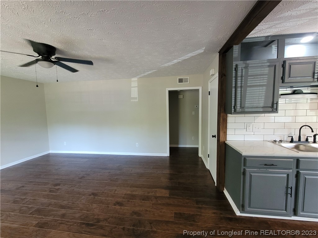 6442 Green Meadow Road Fayetteville, NC 28304 - Photo 10 of 48 a view of a kitchen from the hallway