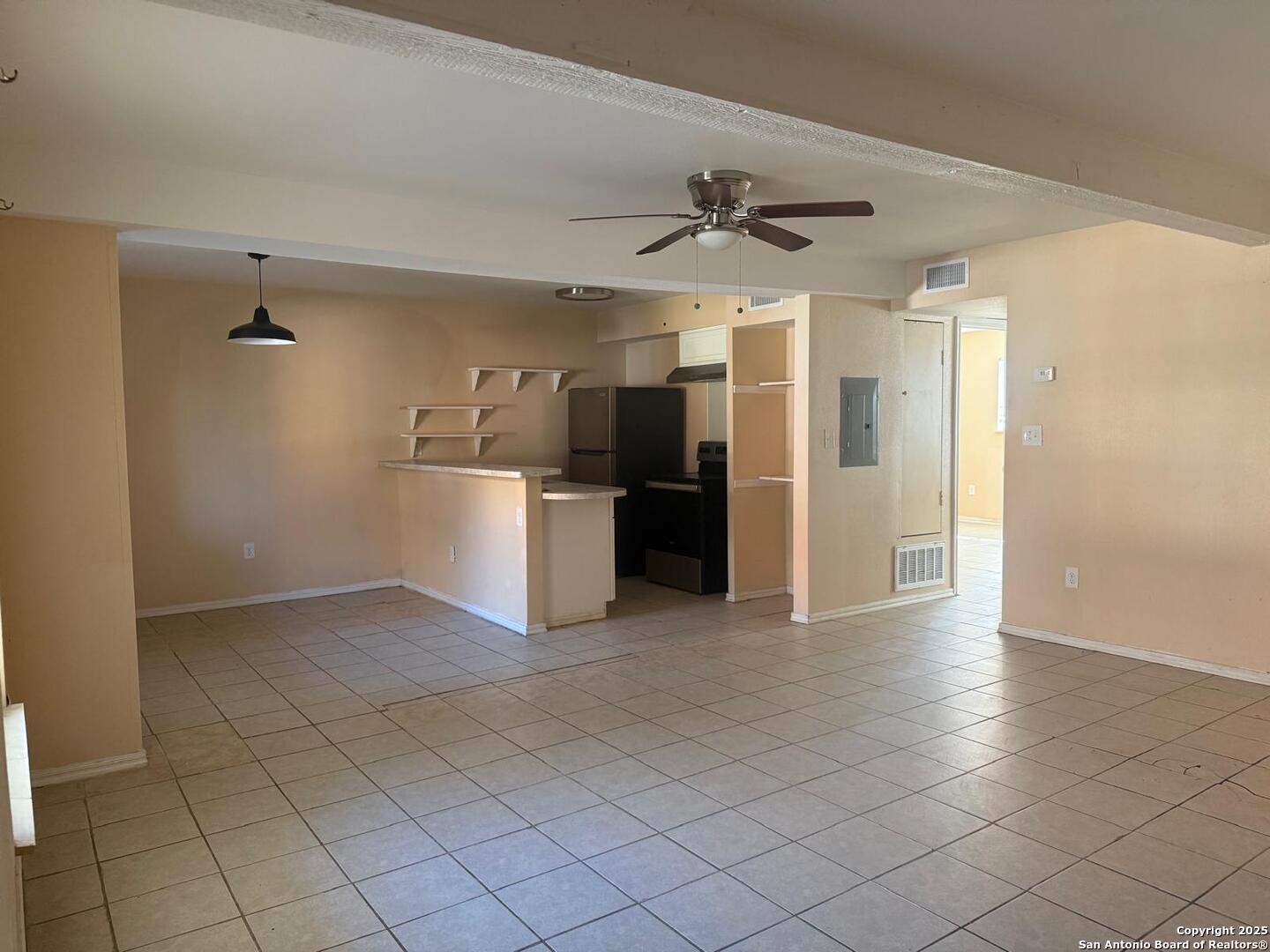 3718 Pleasanton Road, Unit 2103 San Antonio, TX 78221 - Photo 2 of 7 a view of a kitchen with a sink and cabinet
