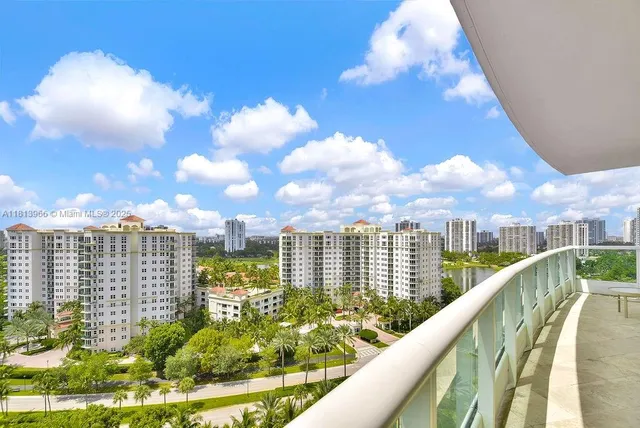 a city view from a balcony with city view