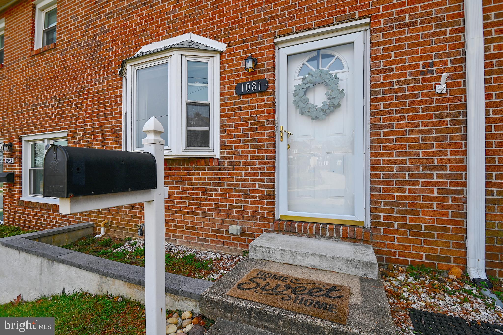 1081 Downton Road Halethorpe, MD 21227 - Photo 2 of 36 a front view of a house with a window