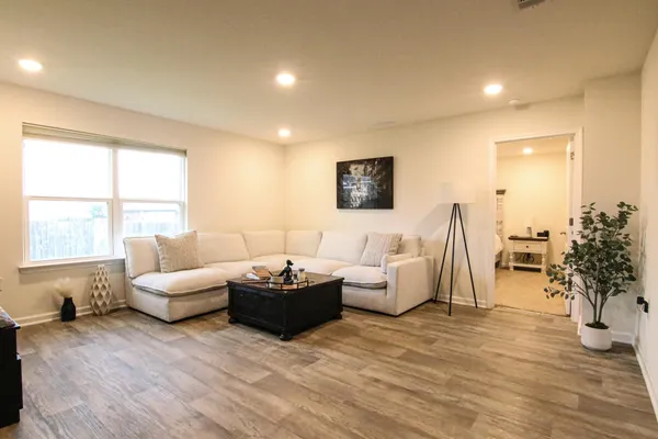 a bathroom with a tub and shower