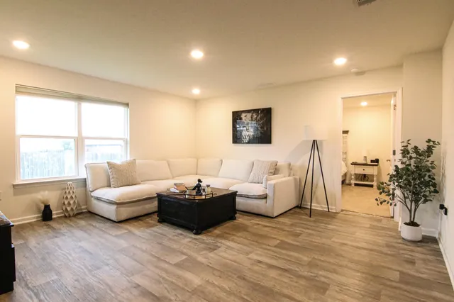 a bathroom with a tub and shower
