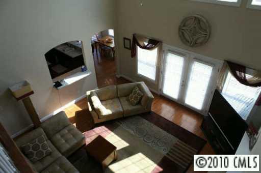 314 Chancelot Lane Fort Mill, SC 29708 - Photo 3 of 8 a living room with furniture and a flat screen tv