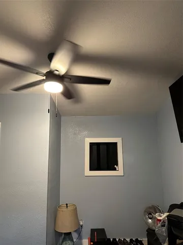 a room with furniture and a window