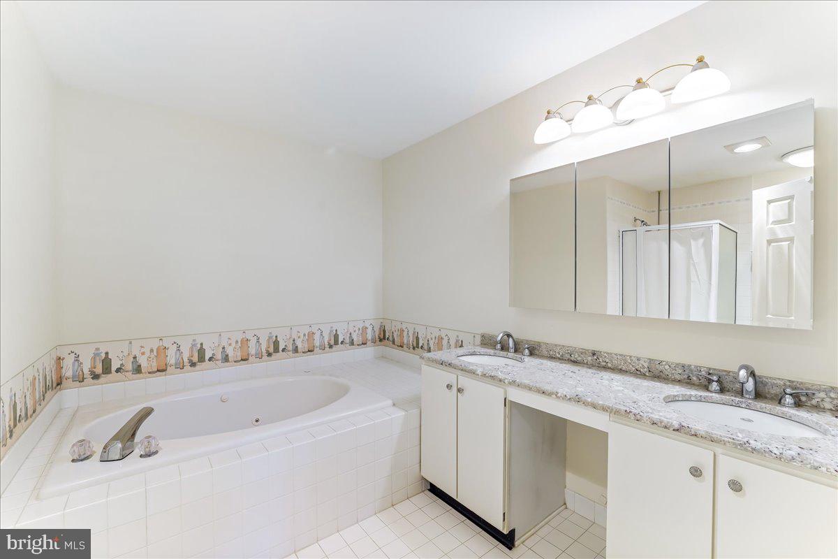 2307 Sterling Road, Unit 23 Yardley, PA 19067 - Photo 32 of 38 Primary Bath Jacuzzi Tub/Upgraded Countertops