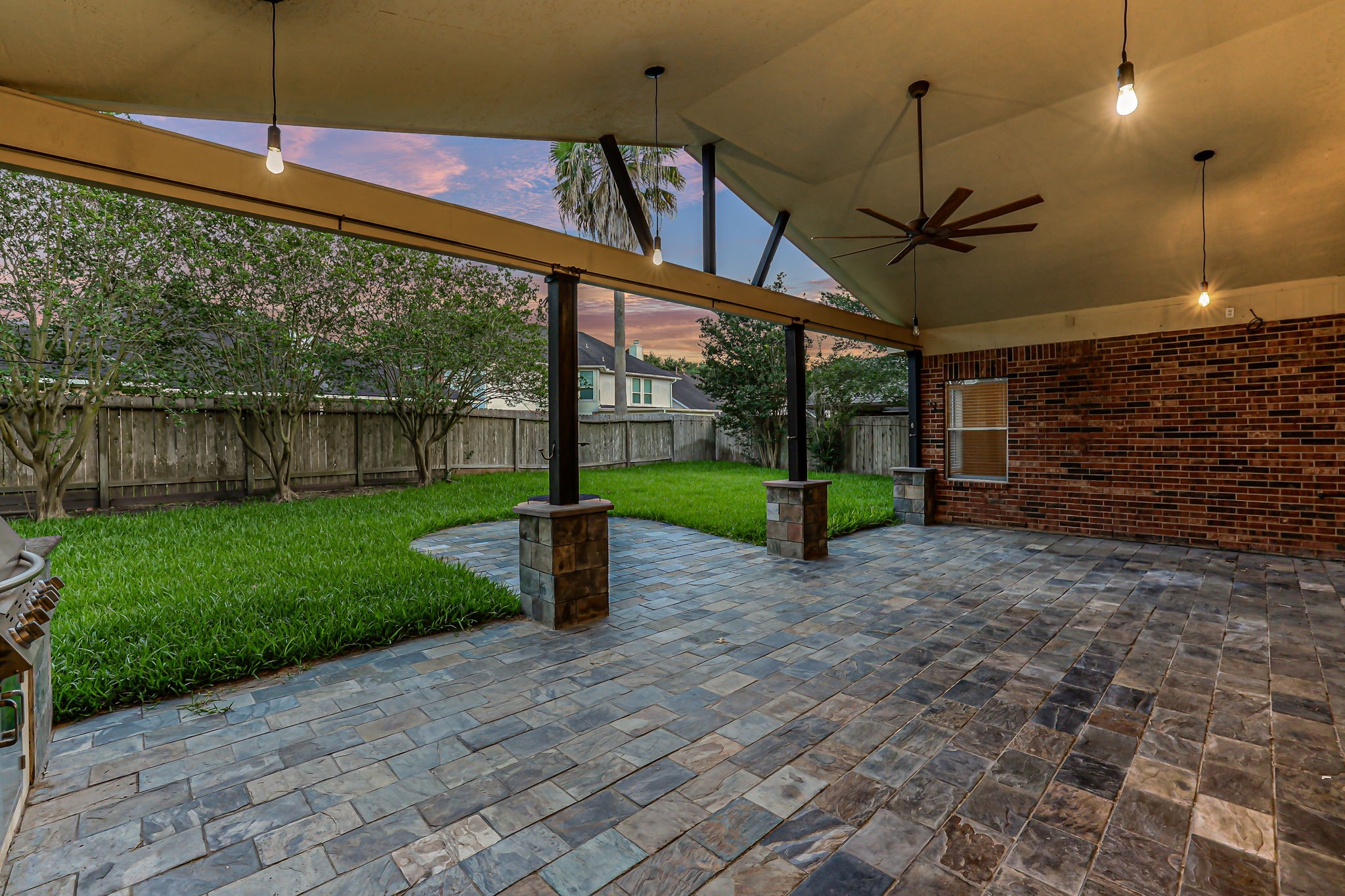 23207 Olive Ridge Court Katy, TX 77494 - Photo 44 of 46 a view of a backyard with table and chairs