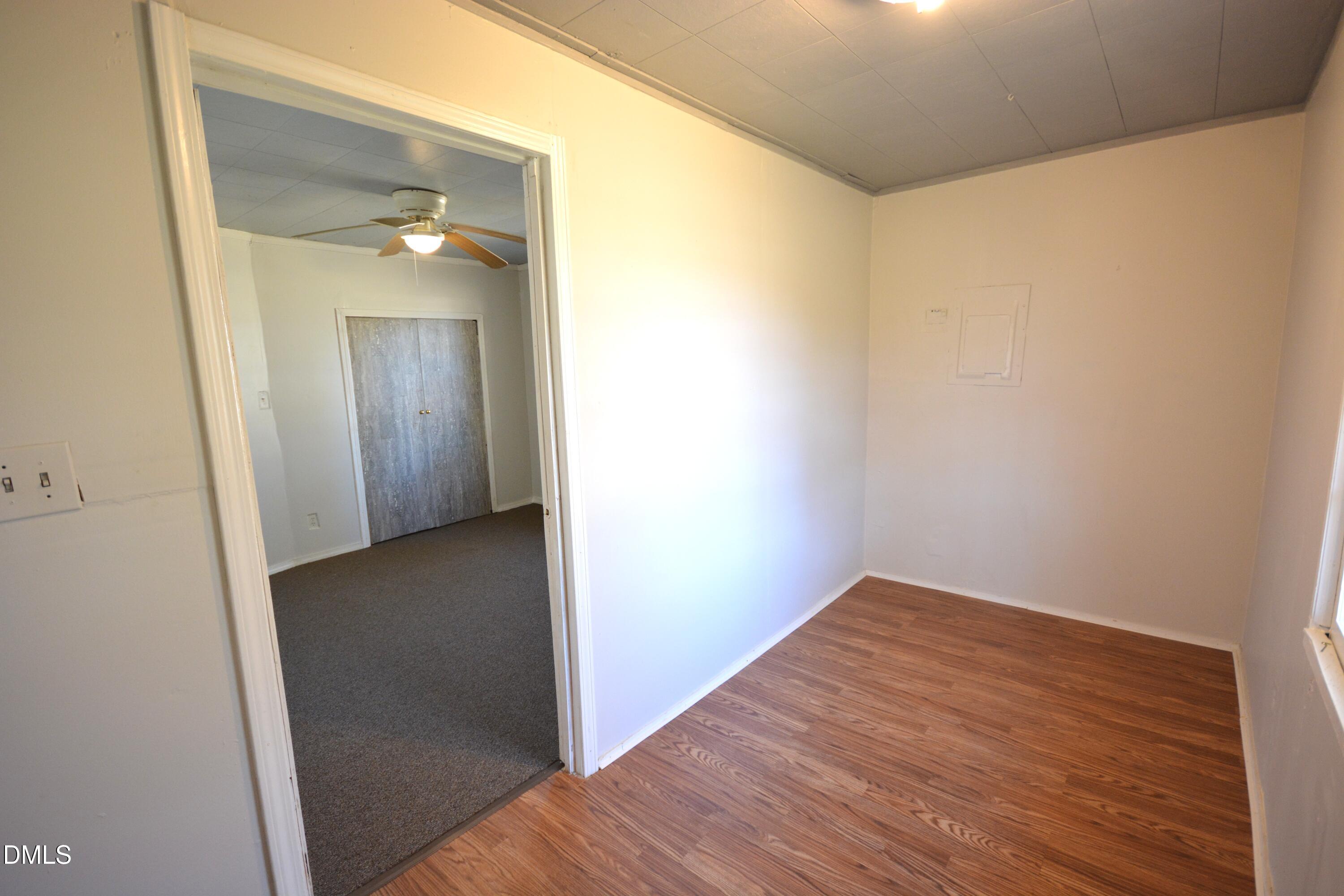 1324 Raleigh Road Oxford, NC 27565 - Photo 12 of 18 a view of a hallway with wooden floor