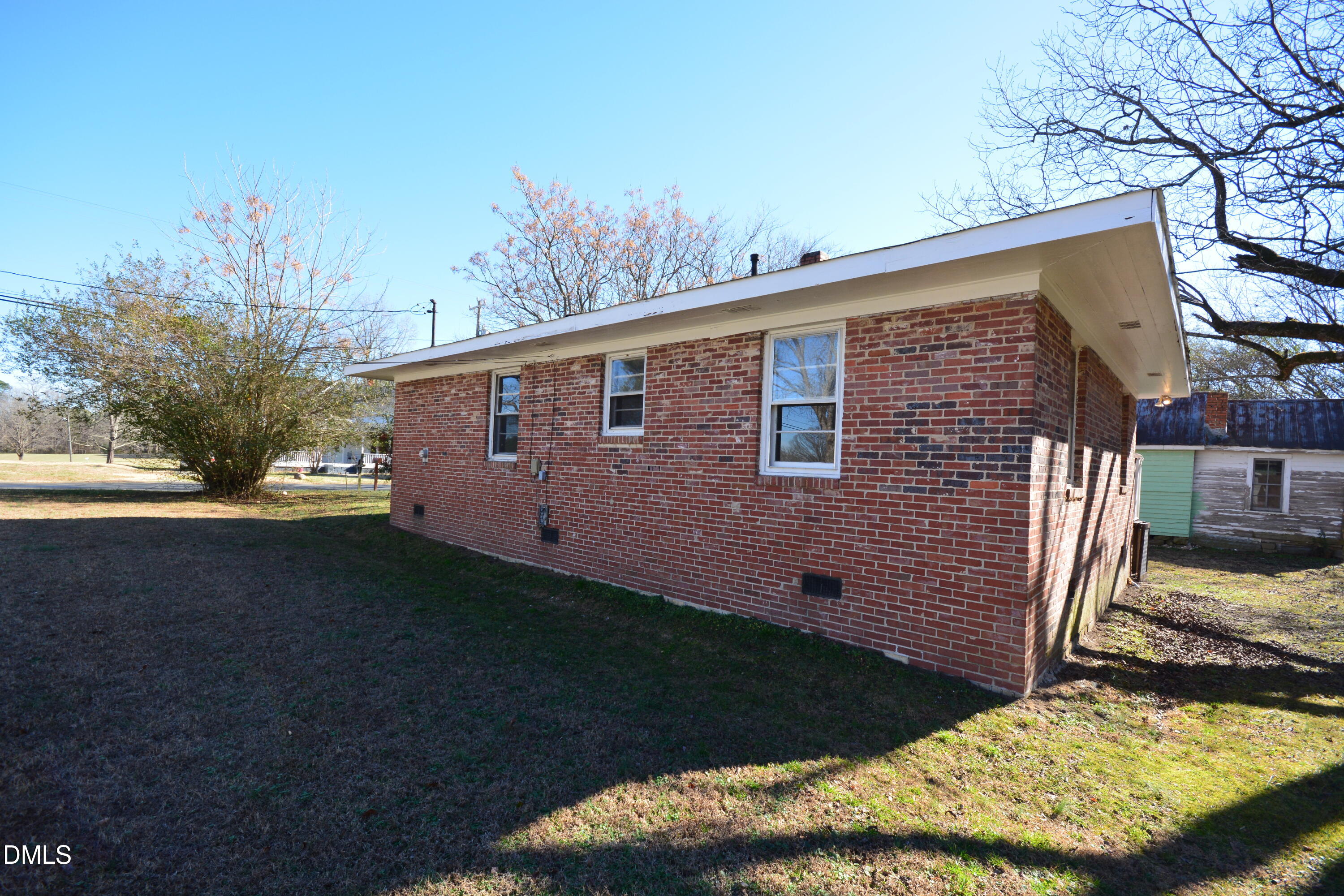 1324 Raleigh Road Oxford, NC 27565 - Photo 14 of 18 a front view of a house with garden