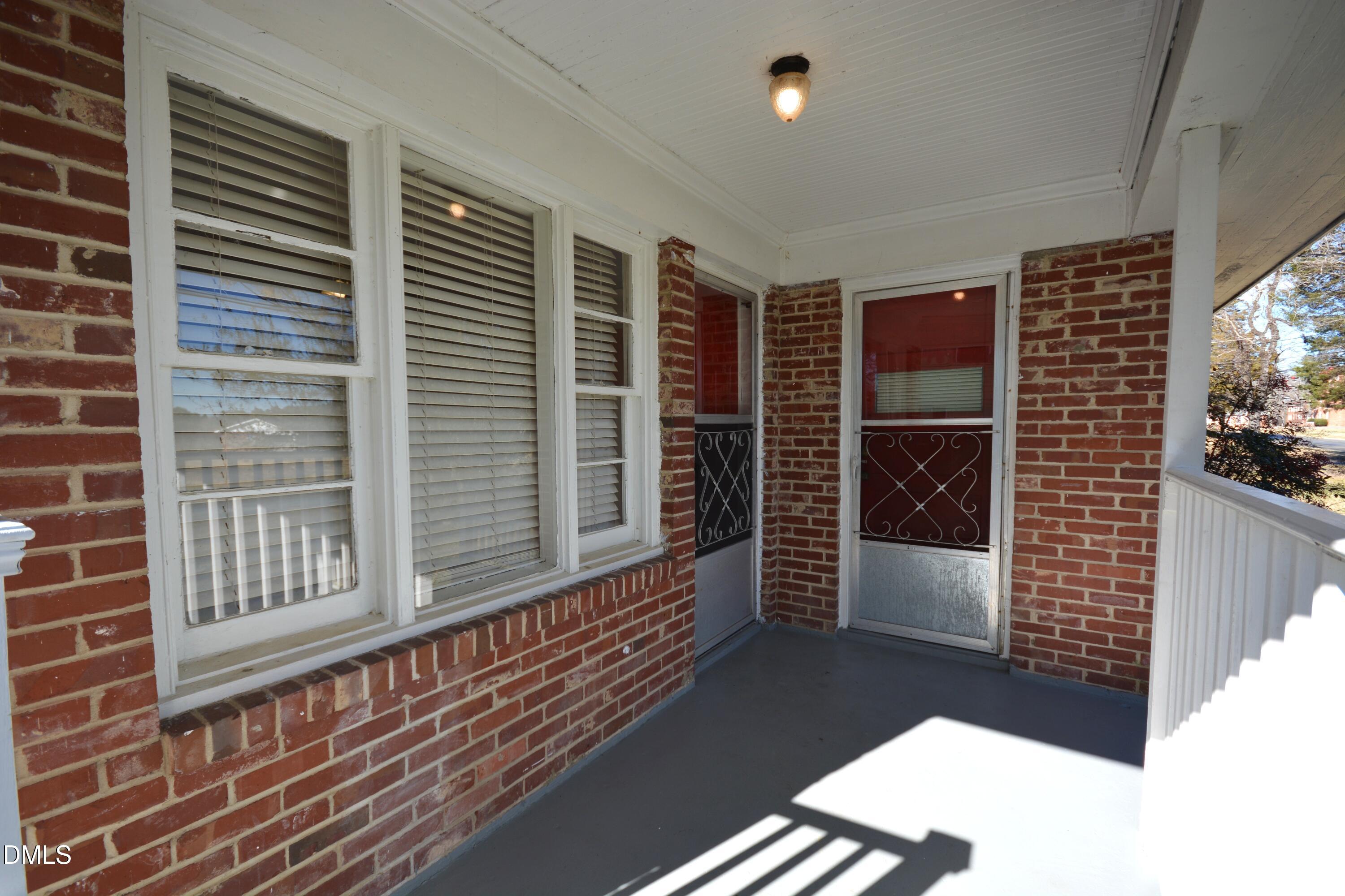 1324 Raleigh Road Oxford, NC 27565 - Photo 2 of 18 a view of a door and a balcony
