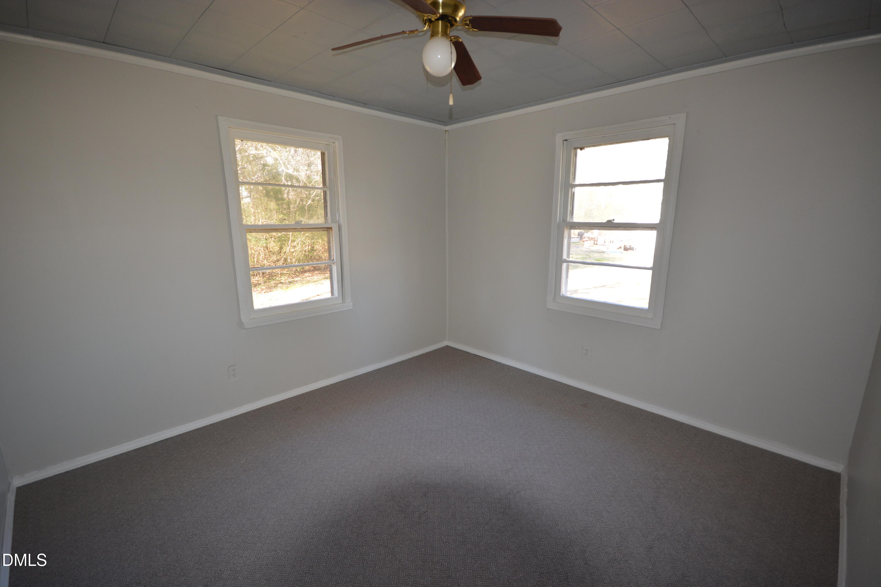 1324 Raleigh Road Oxford, NC 27565 - Photo 9 of 18 an empty room with a window