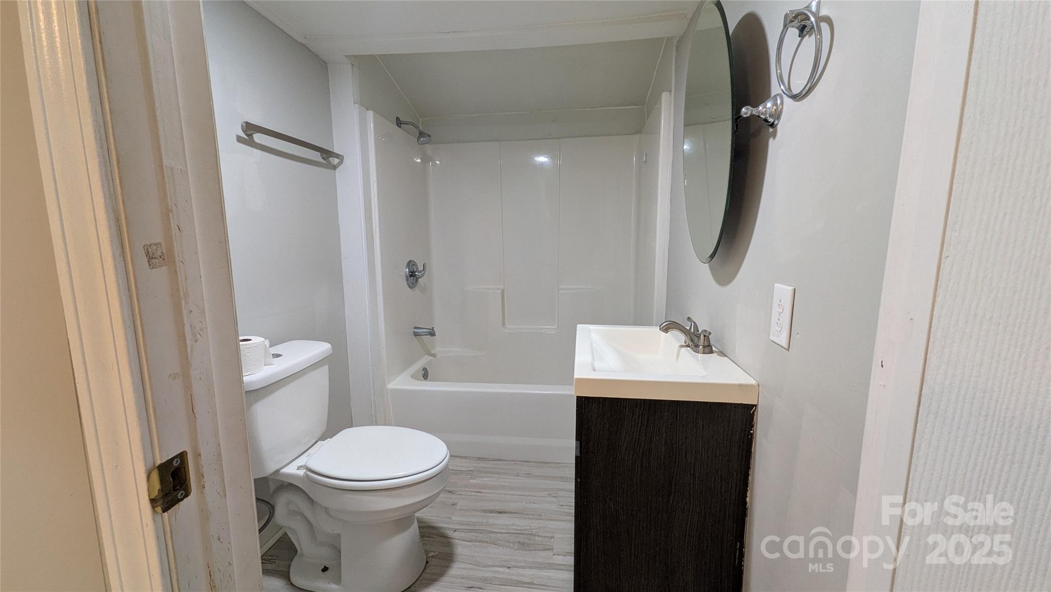 110 Dye Street Chester, SC 29706 - Photo 12 of 22 a bathroom with a sink toilet and shower
