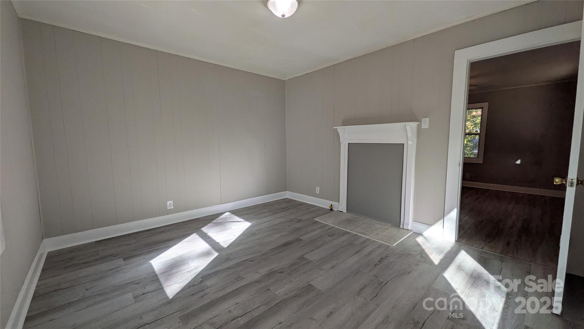 110 Dye Street Chester, SC 29706 - Photo 16 of 22 a view of empty room with wooden floor