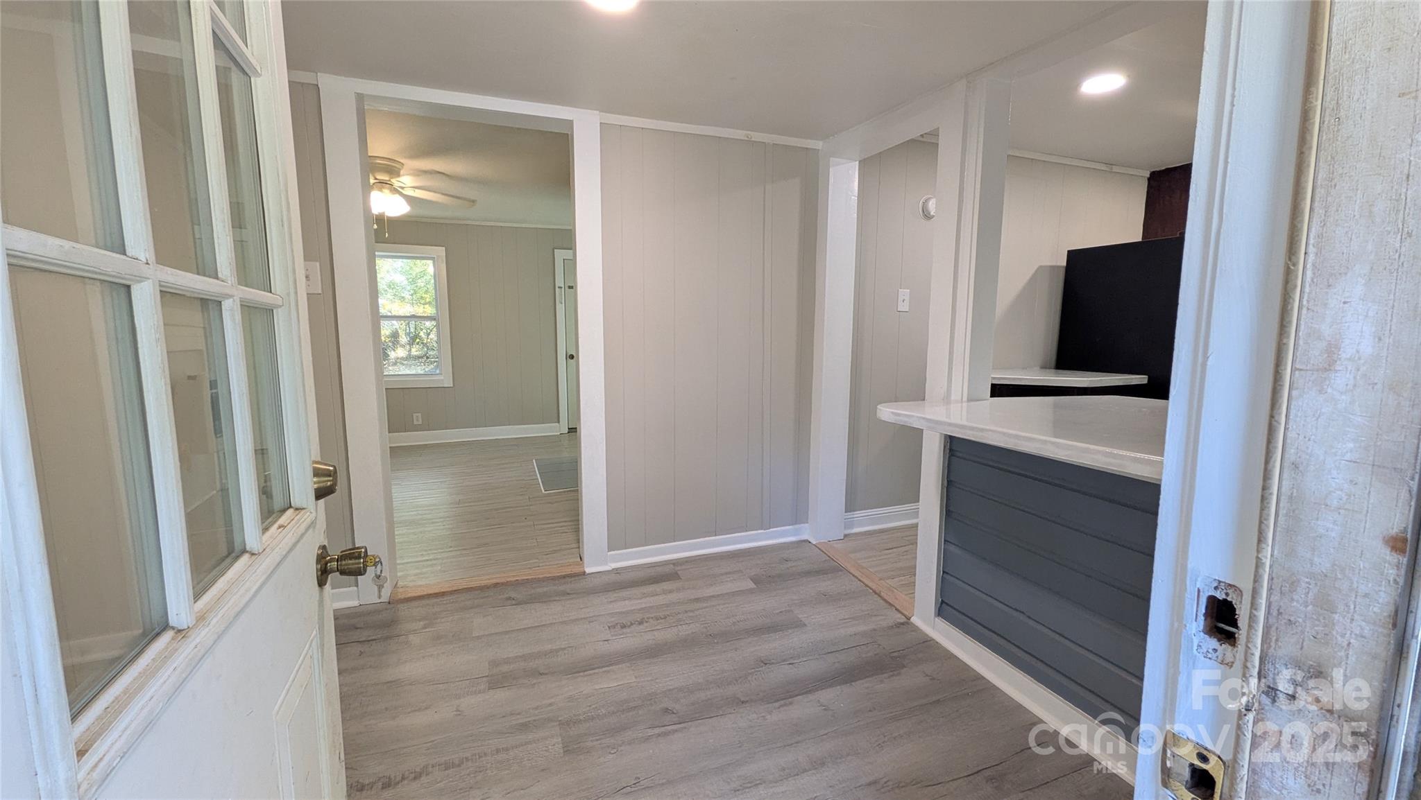 110 Dye Street Chester, SC 29706 - Photo 5 of 22 view of hallway with walk in closet and wooden floor