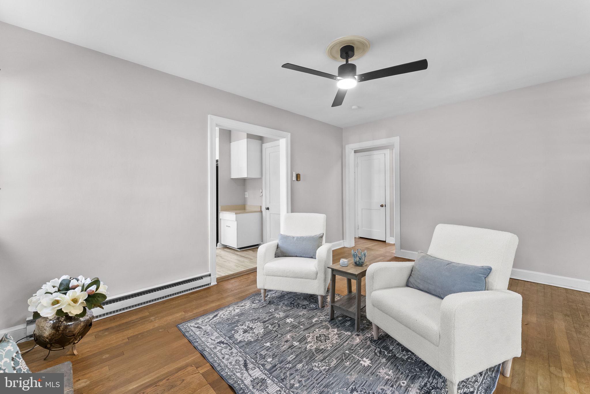 539 Old Meetze Road Warrenton, VA 20186 - Photo 8 of 30 a living room with furniture and a rug