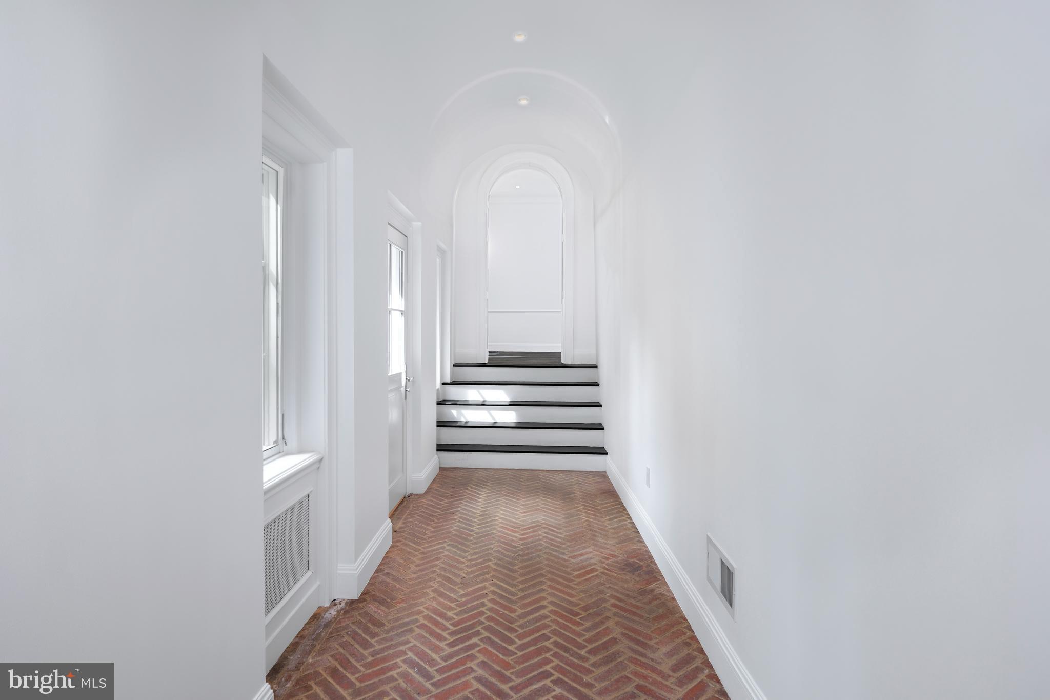87 Library Place Princeton, NJ 08540 - Photo 24 of 60 a view of a hallway with entryway and stairs