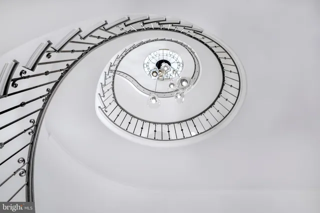 a view of a hallway with a door