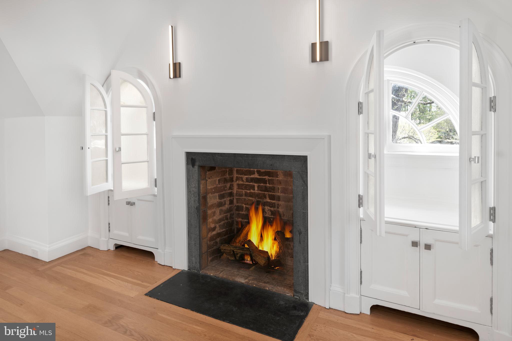 87 Library Place Princeton, NJ 08540 - Photo 51 of 60 a view of empty room with wooden floor and fan