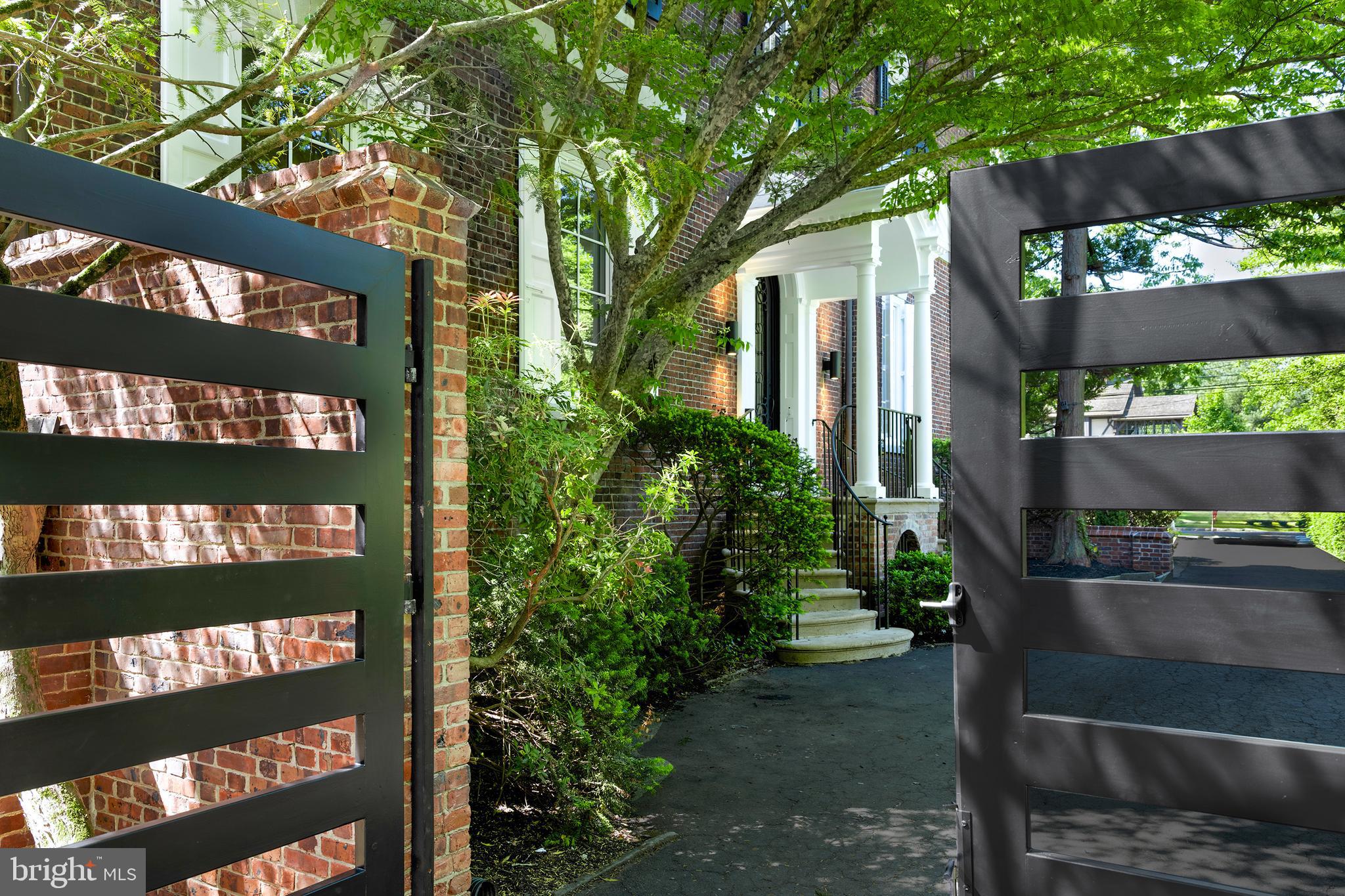 87 Library Place Princeton, NJ 08540 - Photo 6 of 60 a front view of a house with a yard