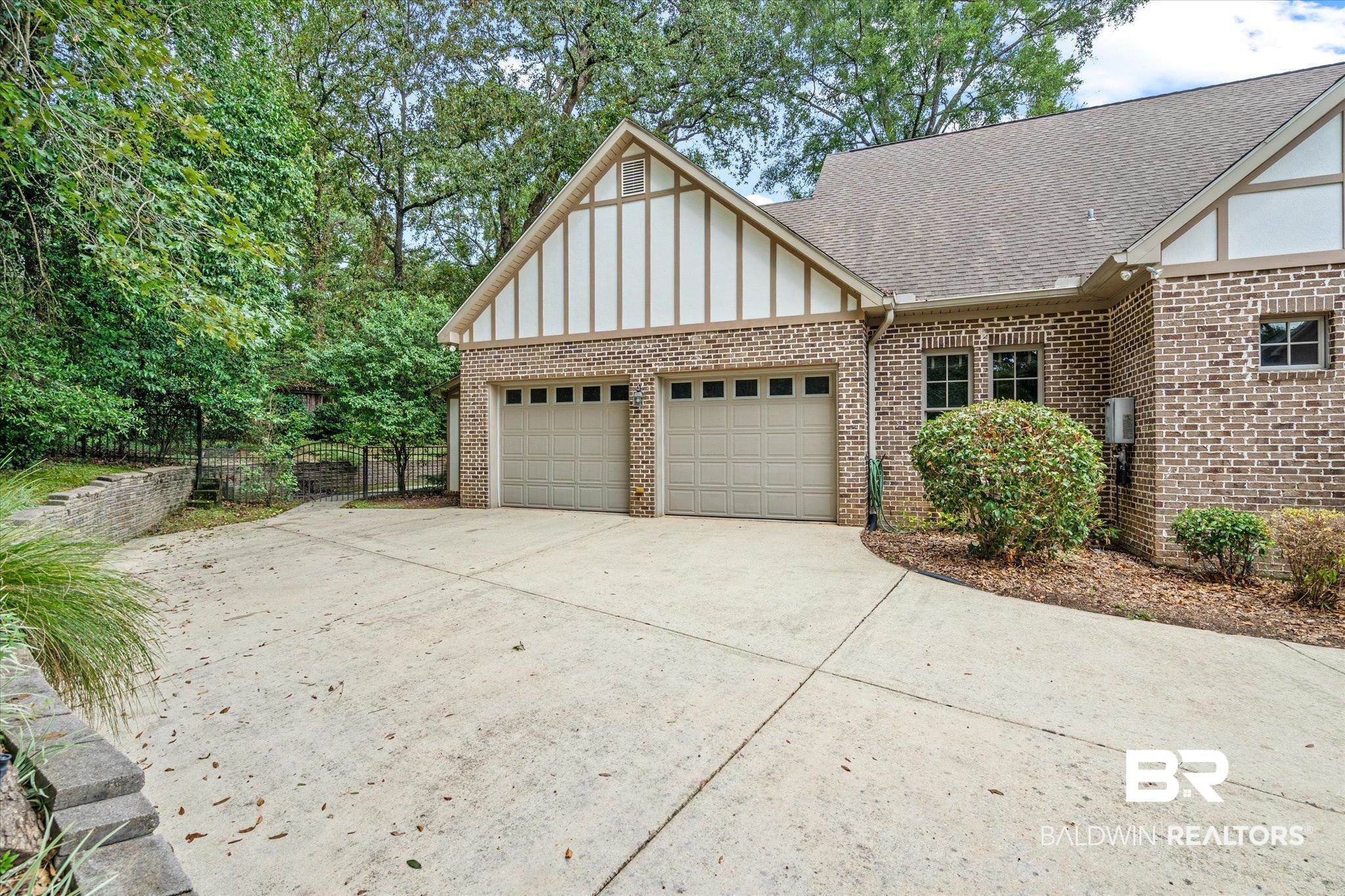 812 Country Club Court Mobile, AL 36609 - Photo 29 of 34 Exterior space with a garage